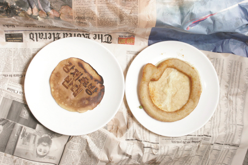 Hotcake (2005) with wheat, frying pan, and oil; provided by the artists